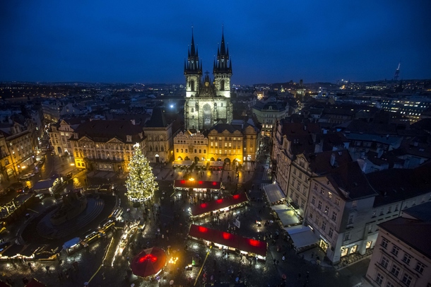 PRAGUE, CZECH REPUBLIC - NOVEMBER 30: A general view of the illuminated Old Town Square with the Christmas tree at the Christmas market on November 30, 2015 in Prague, Czech Republic. Christmas markets, traditionally selling mulled wine, roasted chestnuts, hot mead, and Christmas tree decorations amongst other products opened across the Czech Republic during the first Advent weekend. (Photo by Matej Divizna/Getty Images)
