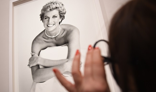 LONDON, ENGLAND - FEBRUARY 10:  An image of Princess Diana is inspected at the press preview for 'Vogue 100: A Century of Style' exhibiting the photographs that has been commissioned by British Vogue since it was founded in 1916 at National Portrait Gallery on February 10, 2016 in London, England.  (Photo by Stuart C. Wilson/Getty Images)
